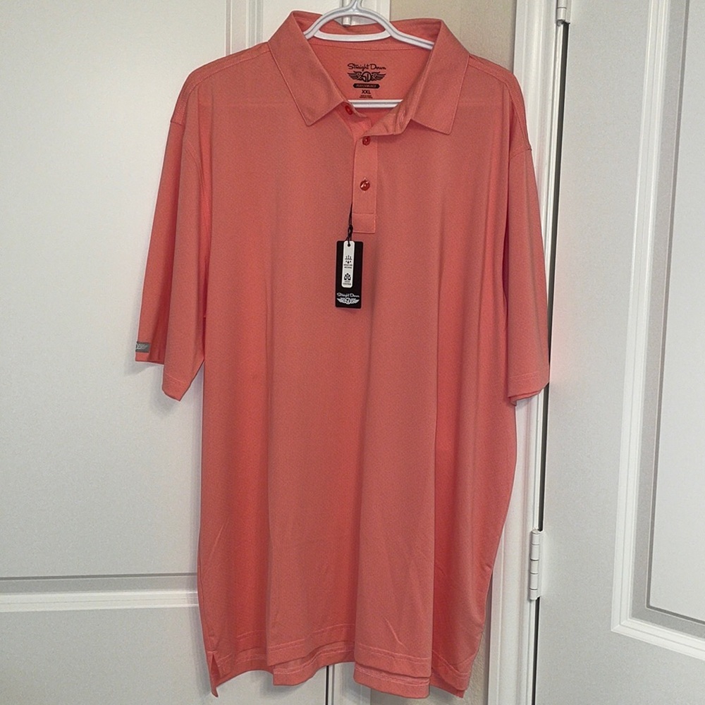 Straight Down Flynn Polo. Moisture wicking. Odor control. Peach/Salmon color